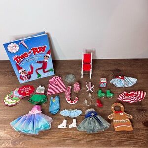 Elf on the Shelf multiple outfits, including Elves at play book and items